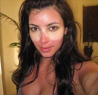 kim kardashian twitter page. Kim Kardashian is sunburnt